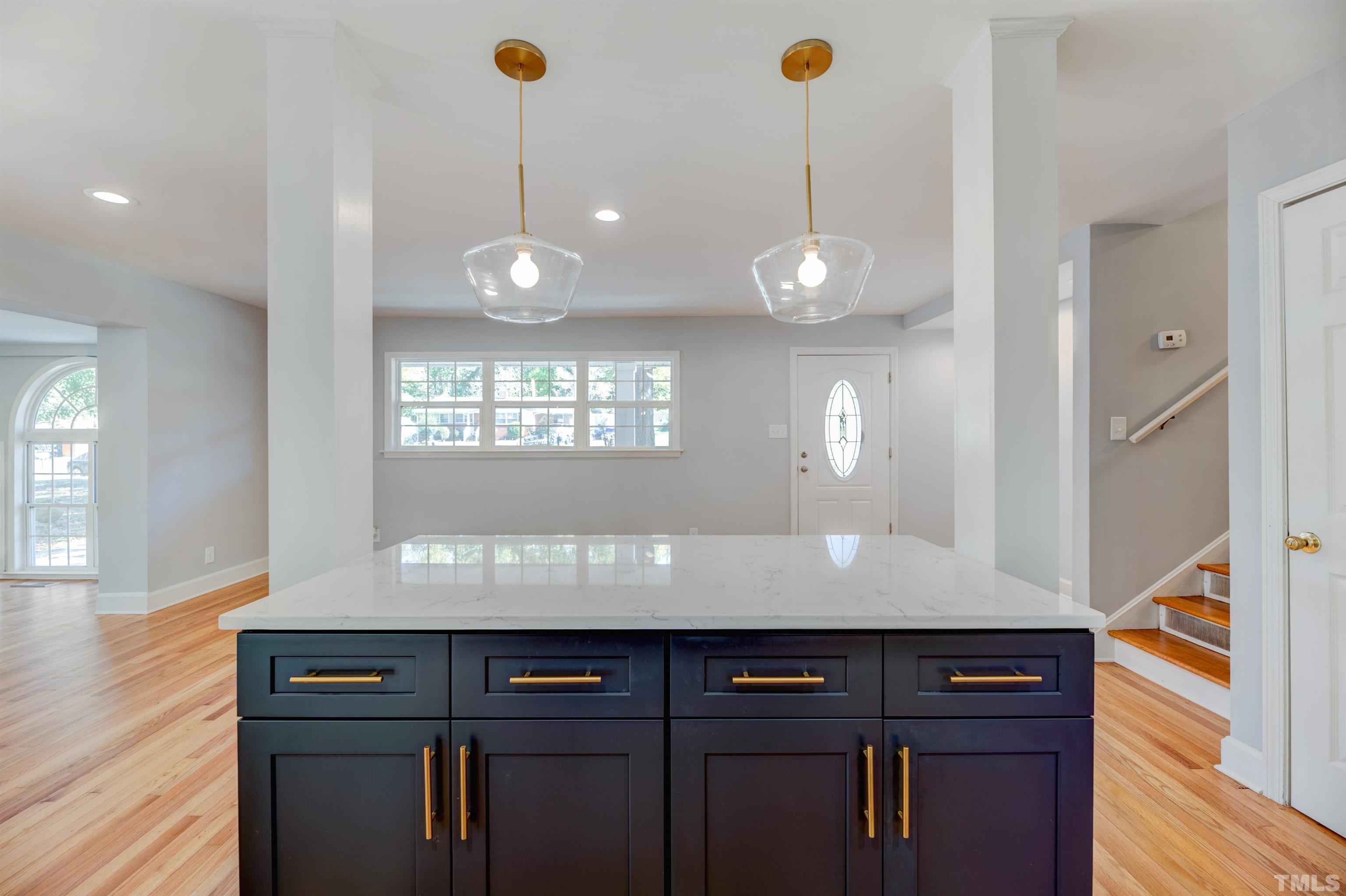 618 Starmont Drive Durham, NC 27705 - Photo 15 of 45 a view of a kitchen with a window and chandelier