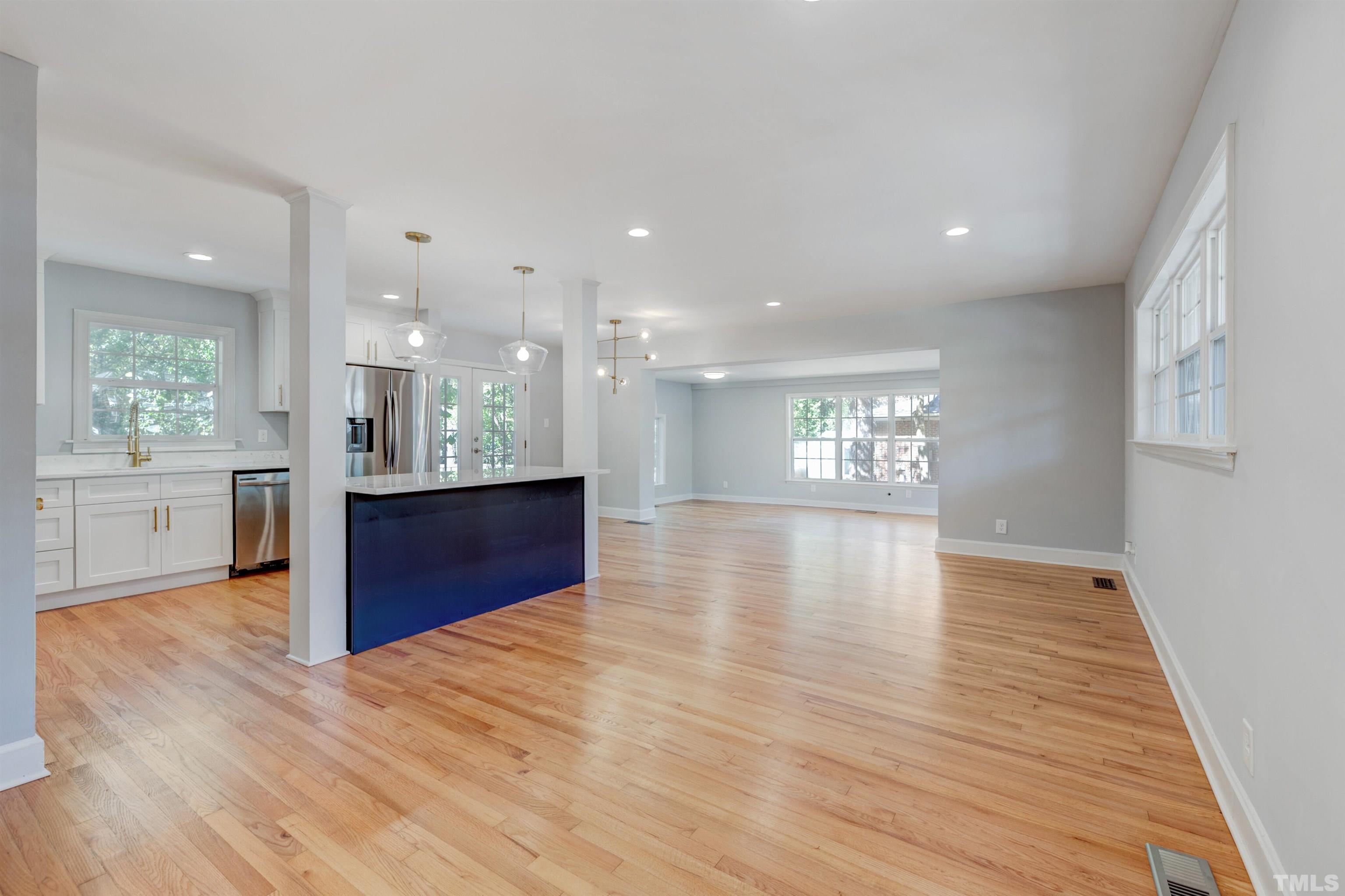 618 Starmont Drive Durham, NC 27705 - Photo 17 of 45 a view of kitchen and hall with wooden floor