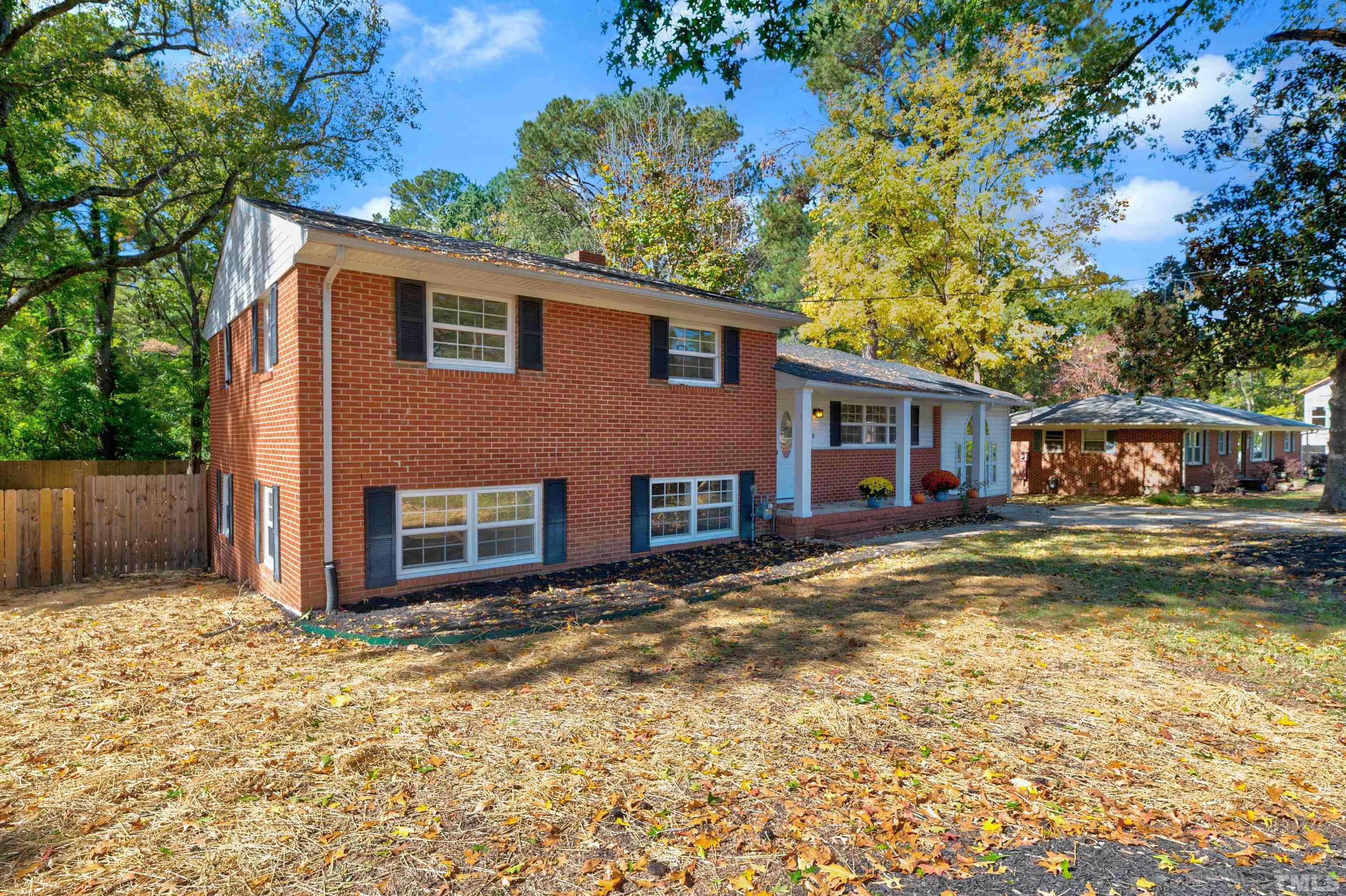 618 Starmont Drive Durham, NC 27705 - Photo 3 of 45 a view of a house with a patio