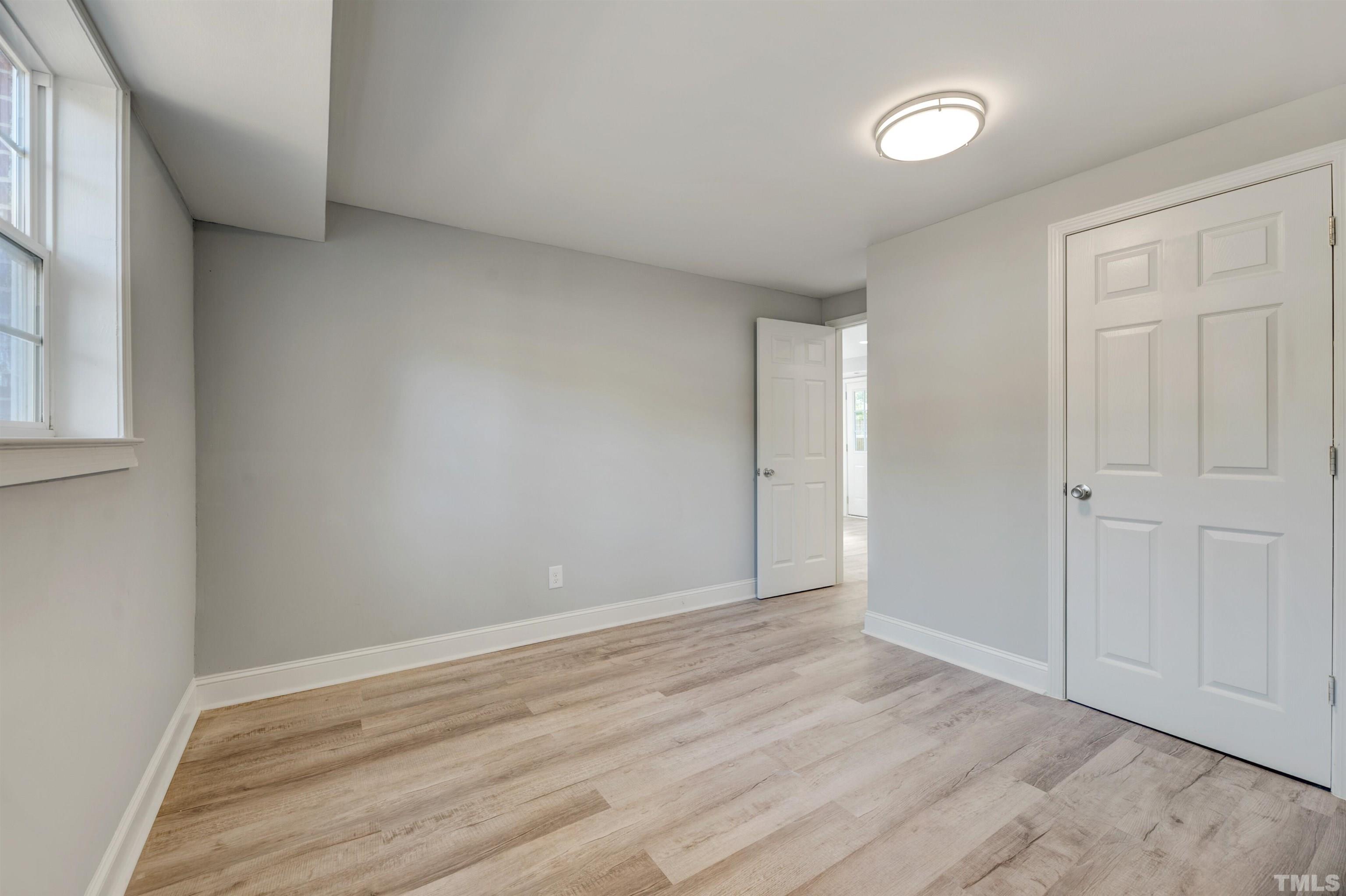 618 Starmont Drive Durham, NC 27705 - Photo 33 of 45 wooden floor in an empty room