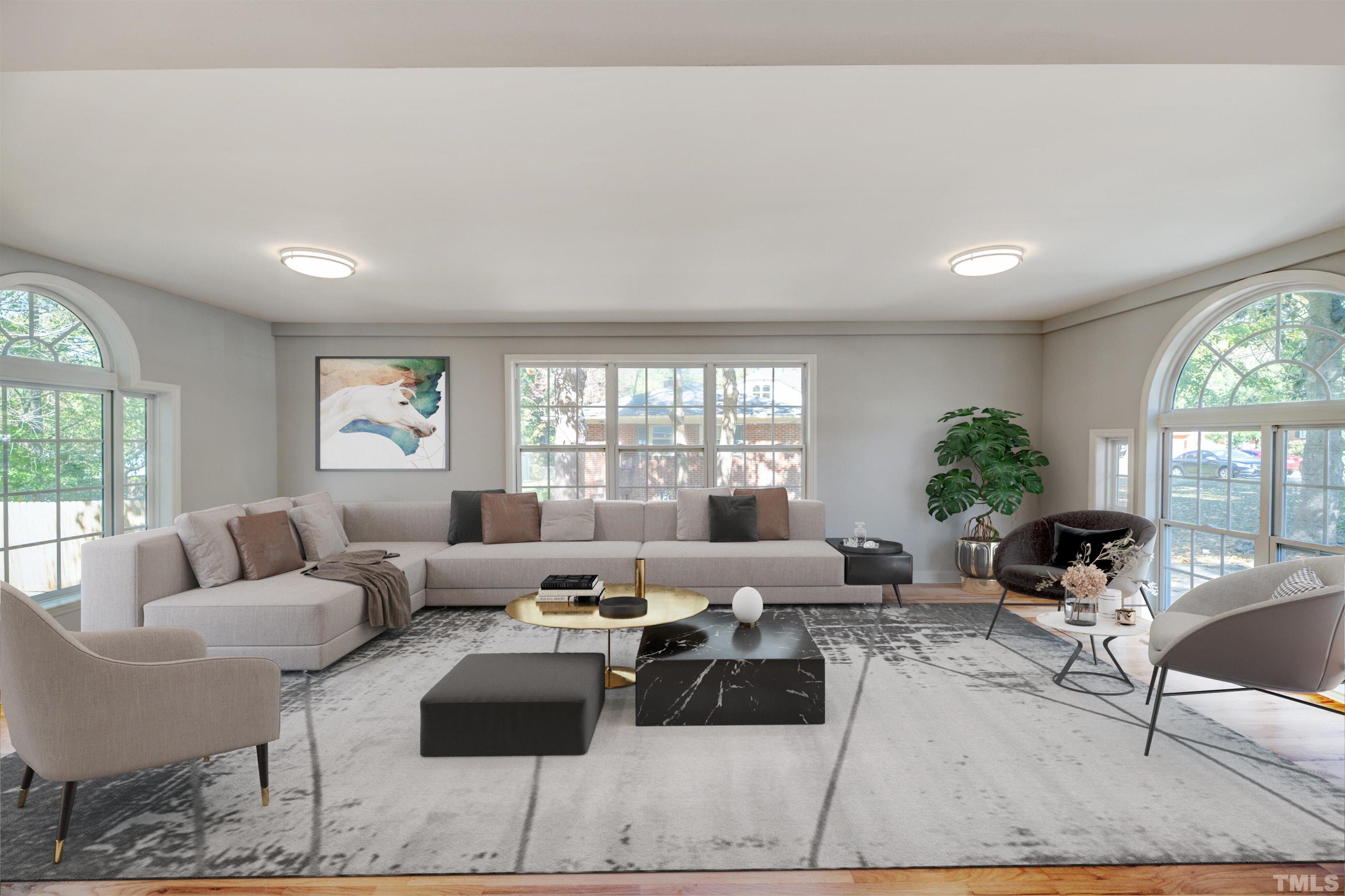 618 Starmont Drive Durham, NC 27705 - Photo 40 of 45 a living room with furniture and a large window
