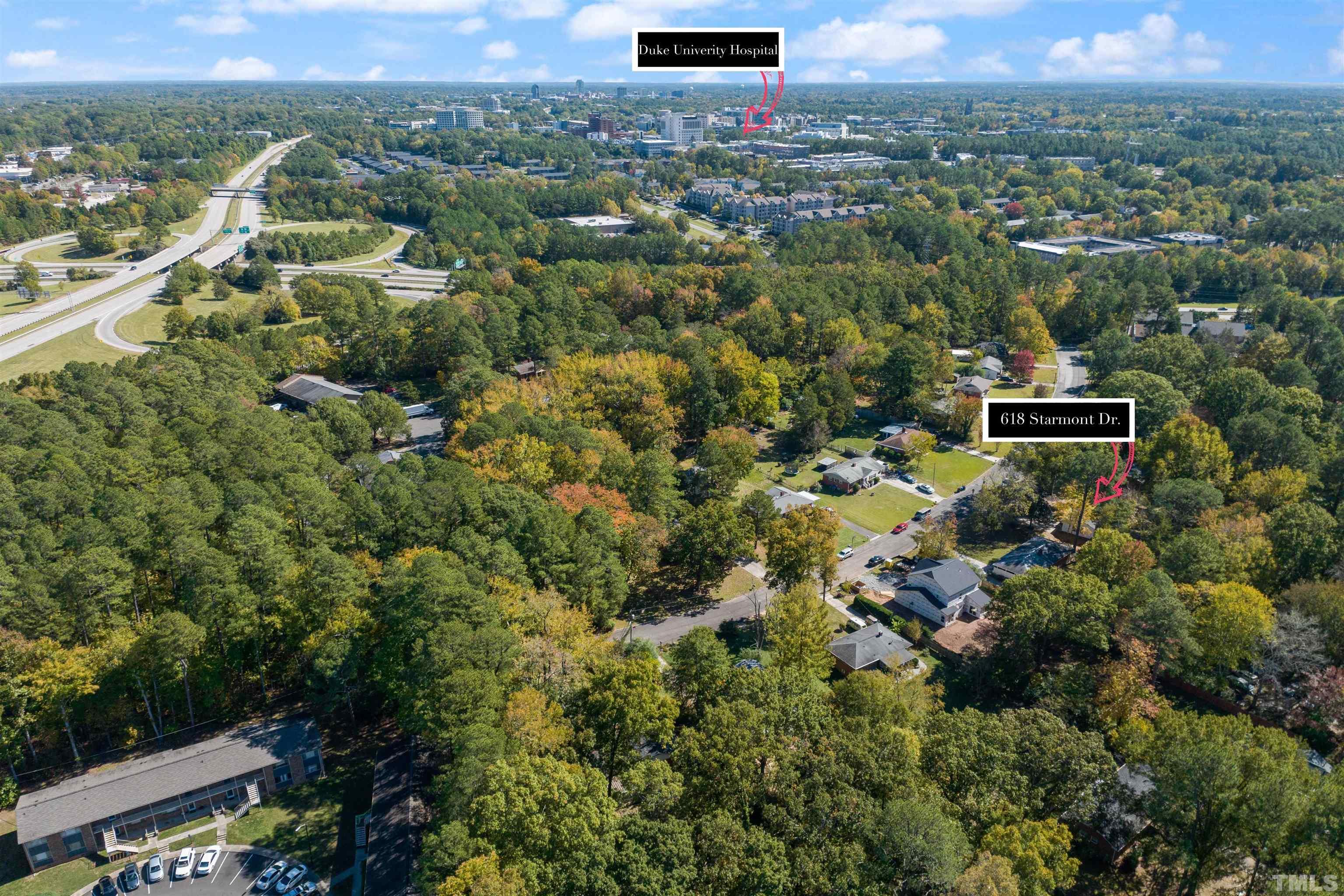 618 Starmont Drive Durham, NC 27705 - Photo 42 of 45 an aerial view of a house with a yard