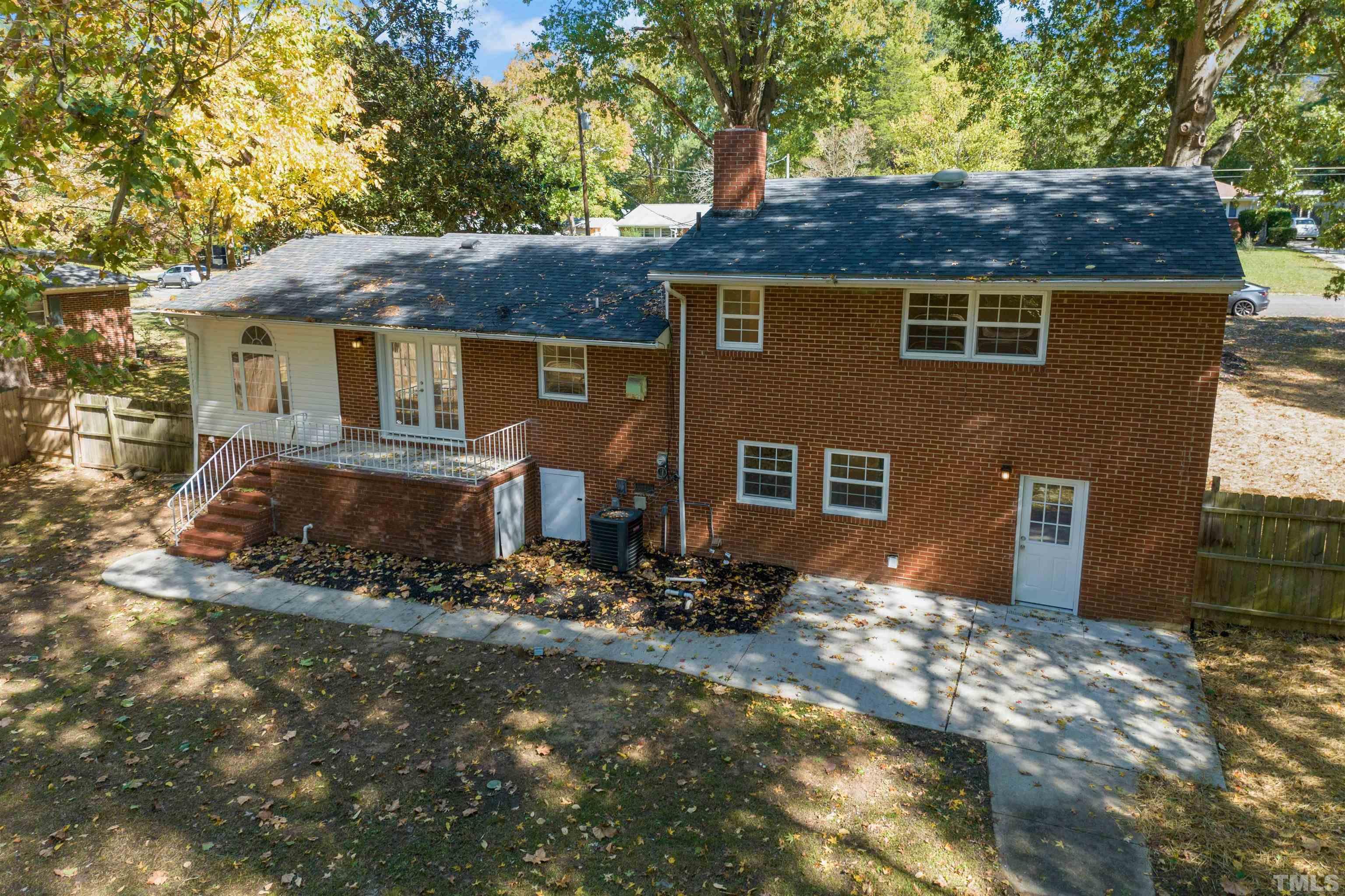 618 Starmont Drive Durham, NC 27705 - Photo 45 of 45 a front view of a house with a yard