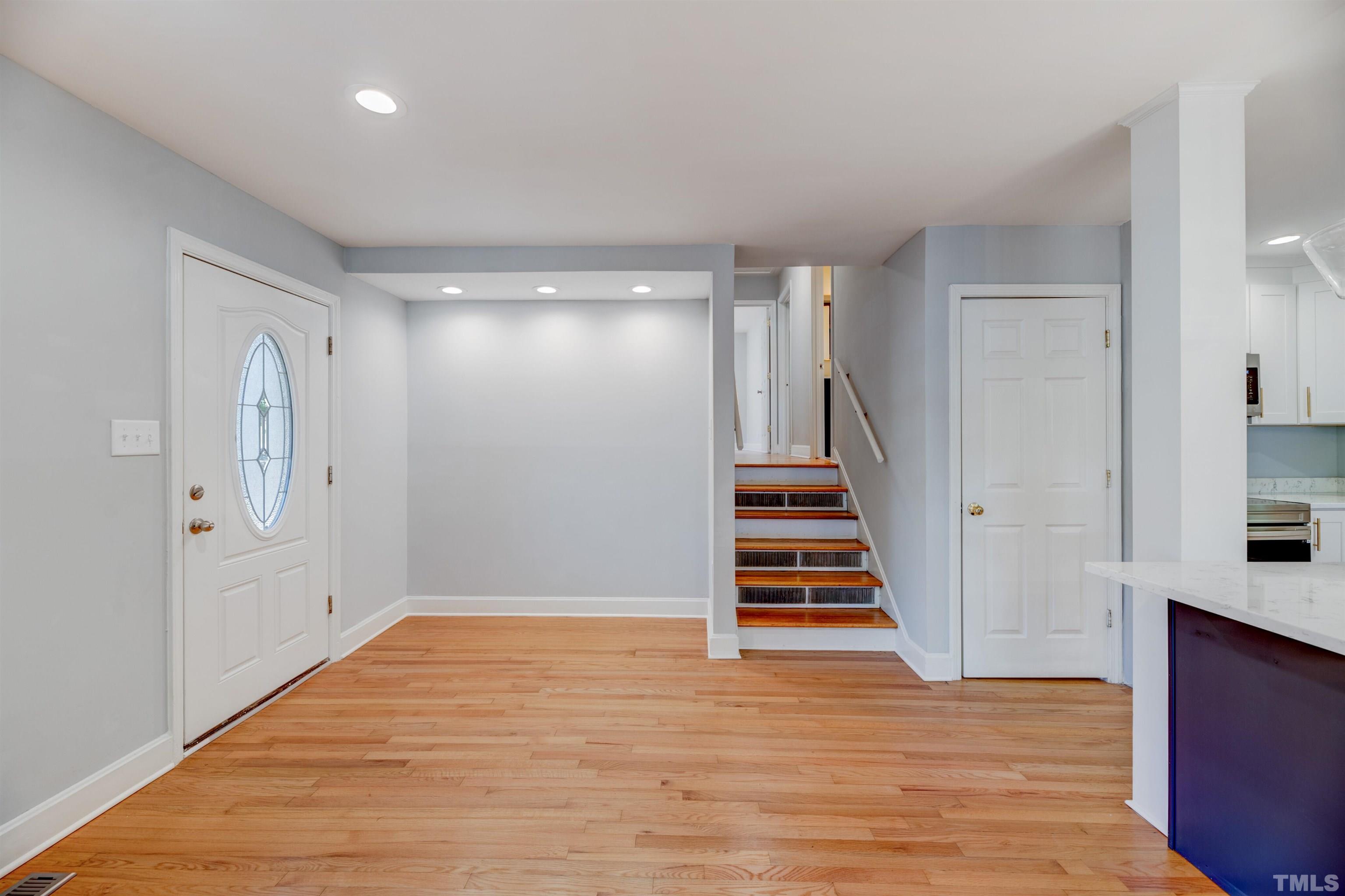 618 Starmont Drive Durham, NC 27705 - Photo 10 of 45 a view of entryway with wooden floor