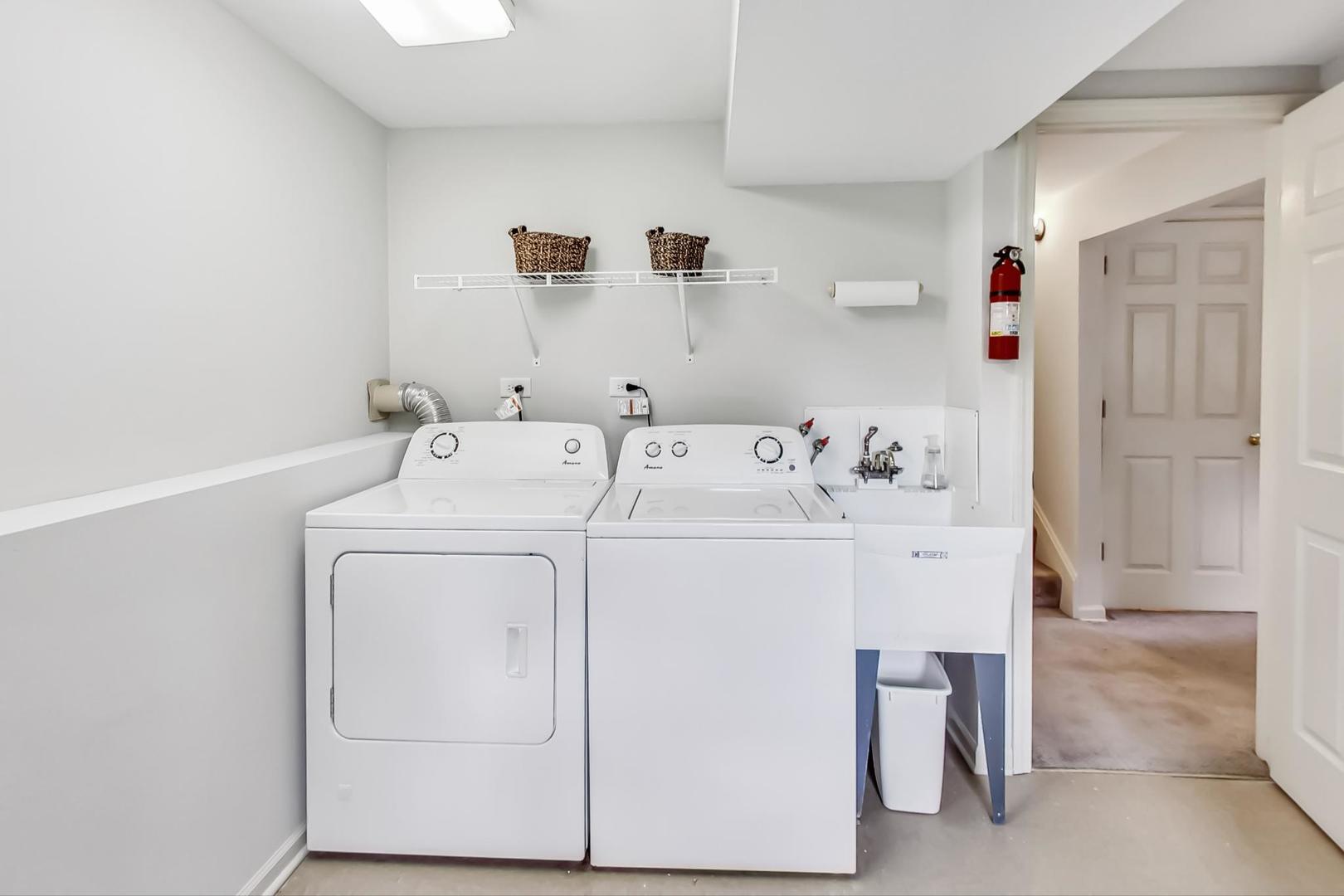 1010 S Road Lisle, IL 60532 - Photo 18 of 29 a utility room with dryer and washer