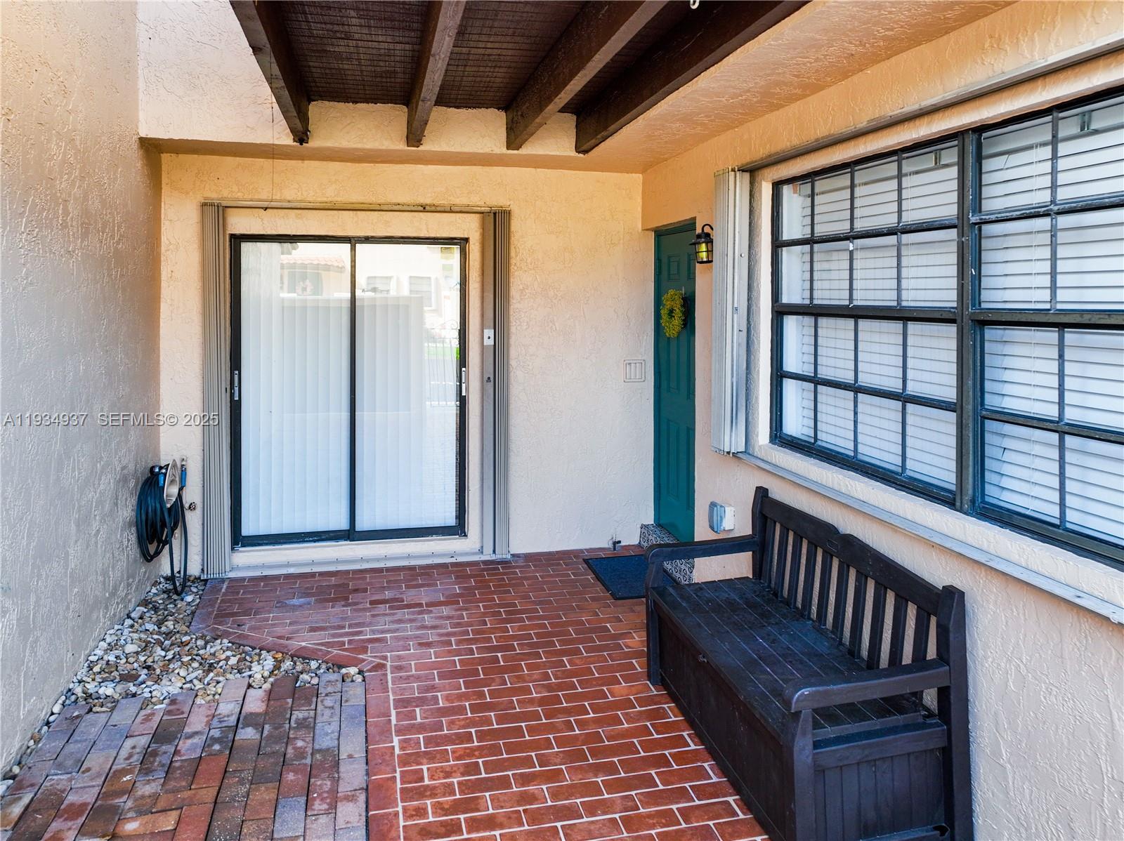 13292 Southwest 114th Terrace Miami, FL 33186 - Photo 5 of 65 a view of an entryway