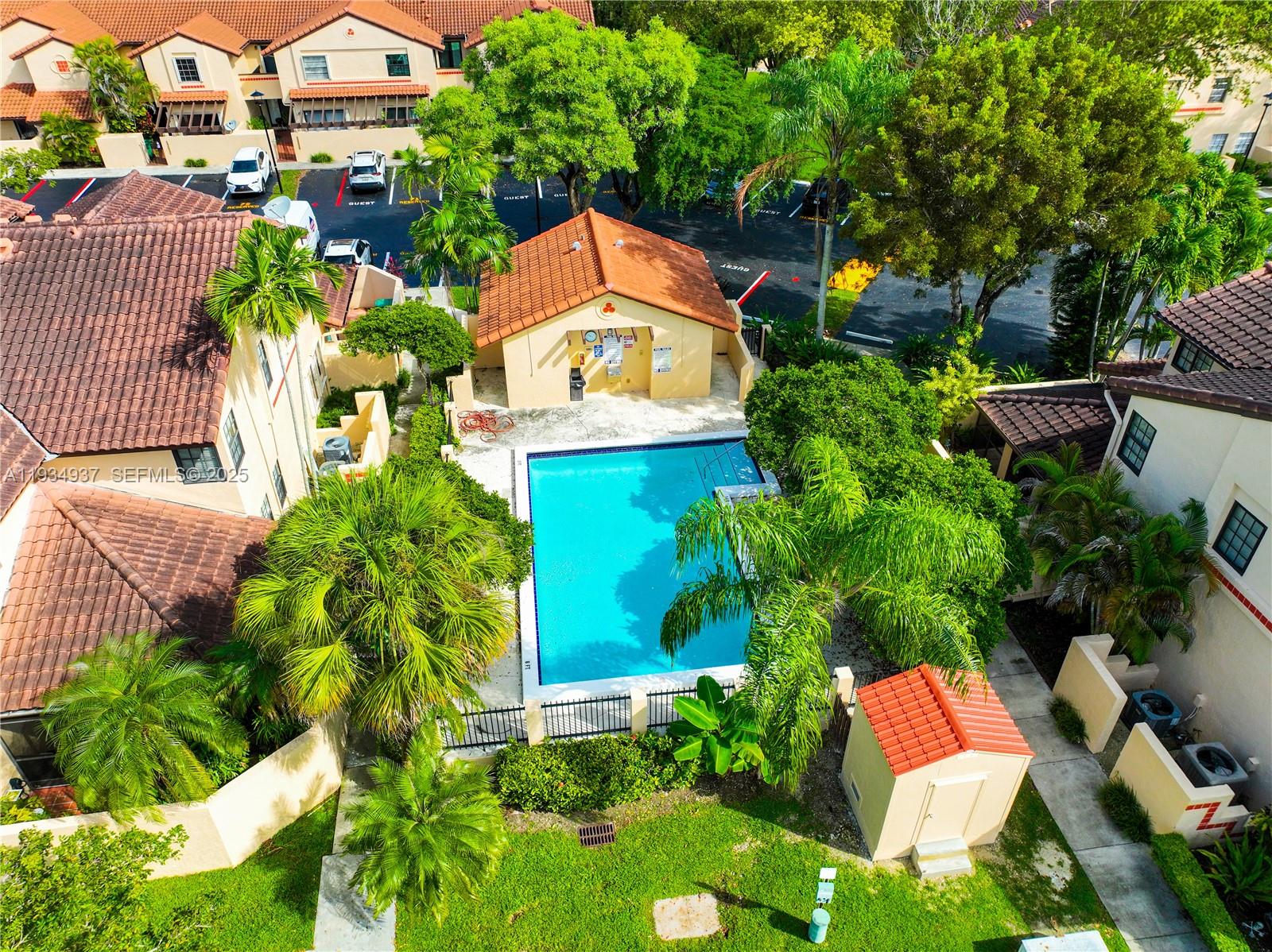 13292 Southwest 114th Terrace Miami, FL 33186 - Photo 52 of 65 an aerial view of a house with a yard and a bench