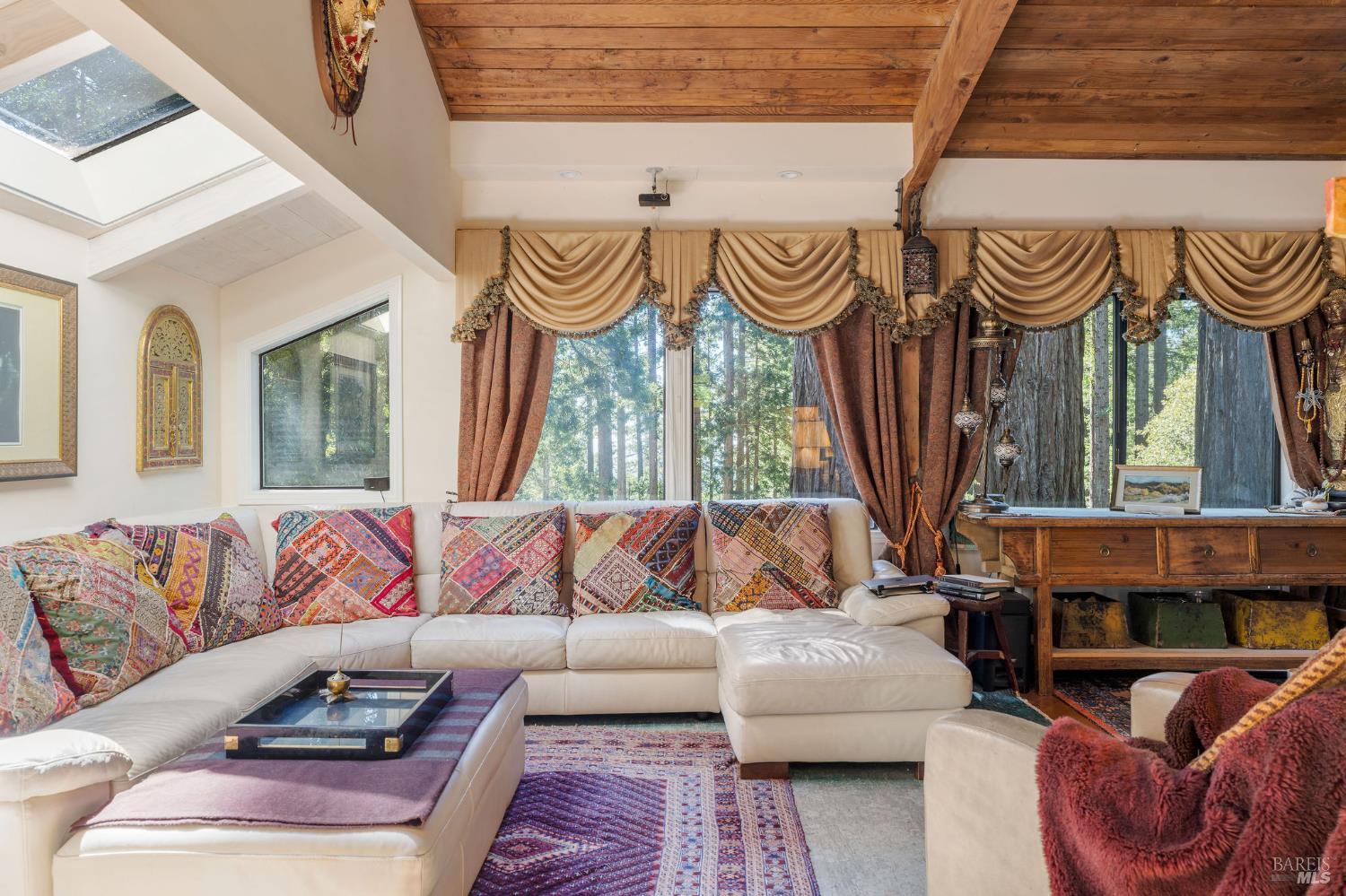 35570 Ocean View Street Gualala, CA 95445 - Photo 34 of 52 a living room with furniture and a large window
