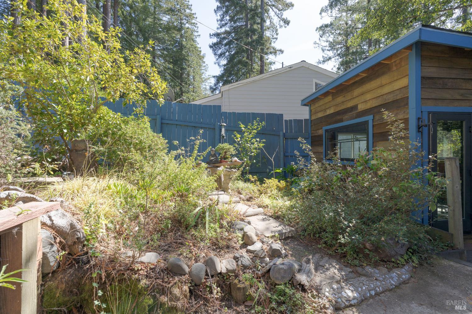 35570 Ocean View Street Gualala, CA 95445 - Photo 44 of 52 a view of a house with a yard