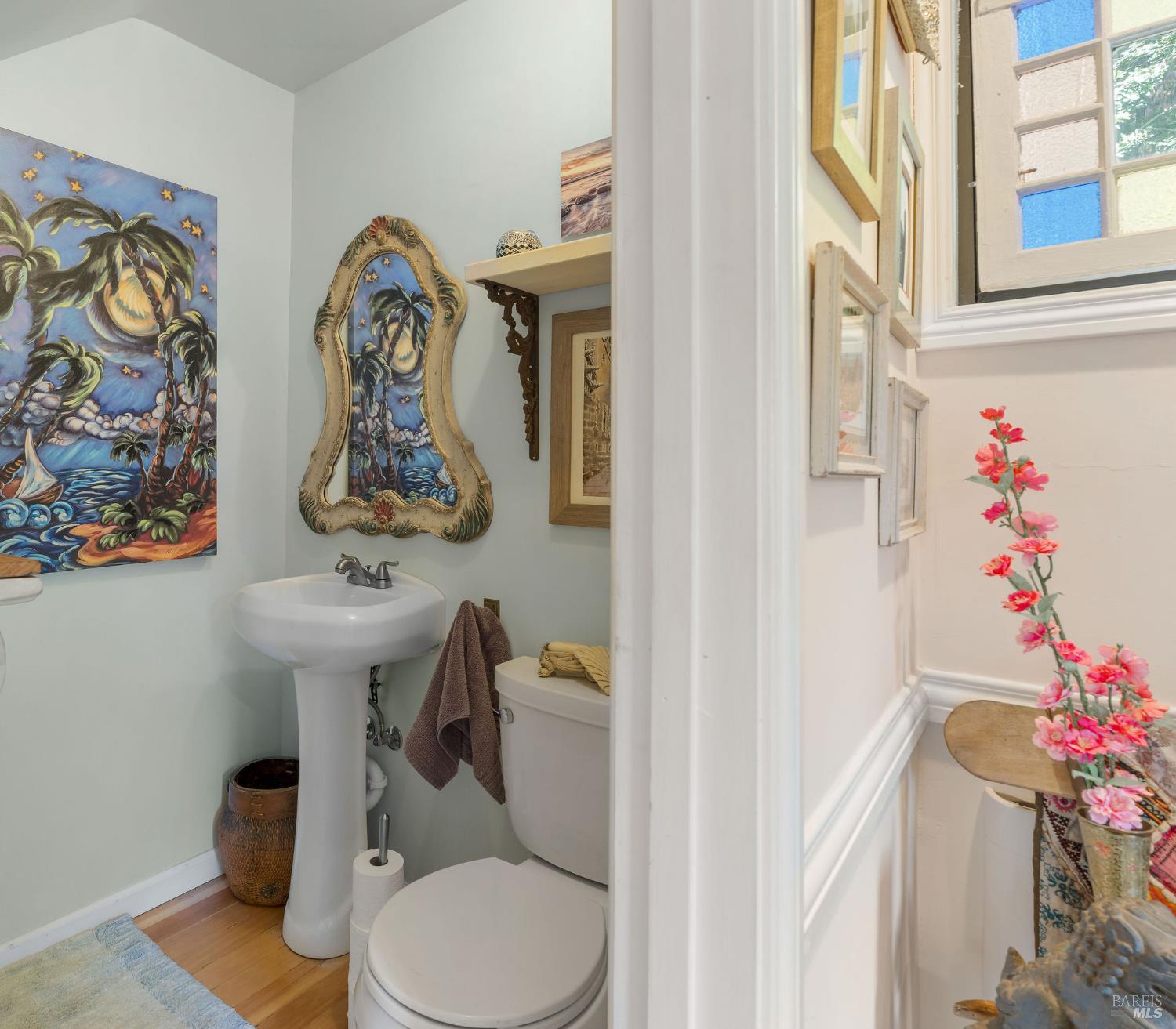 35570 Ocean View Street Gualala, CA 95445 - Photo 10 of 52 a white toilet sitting next to a bathroom sink