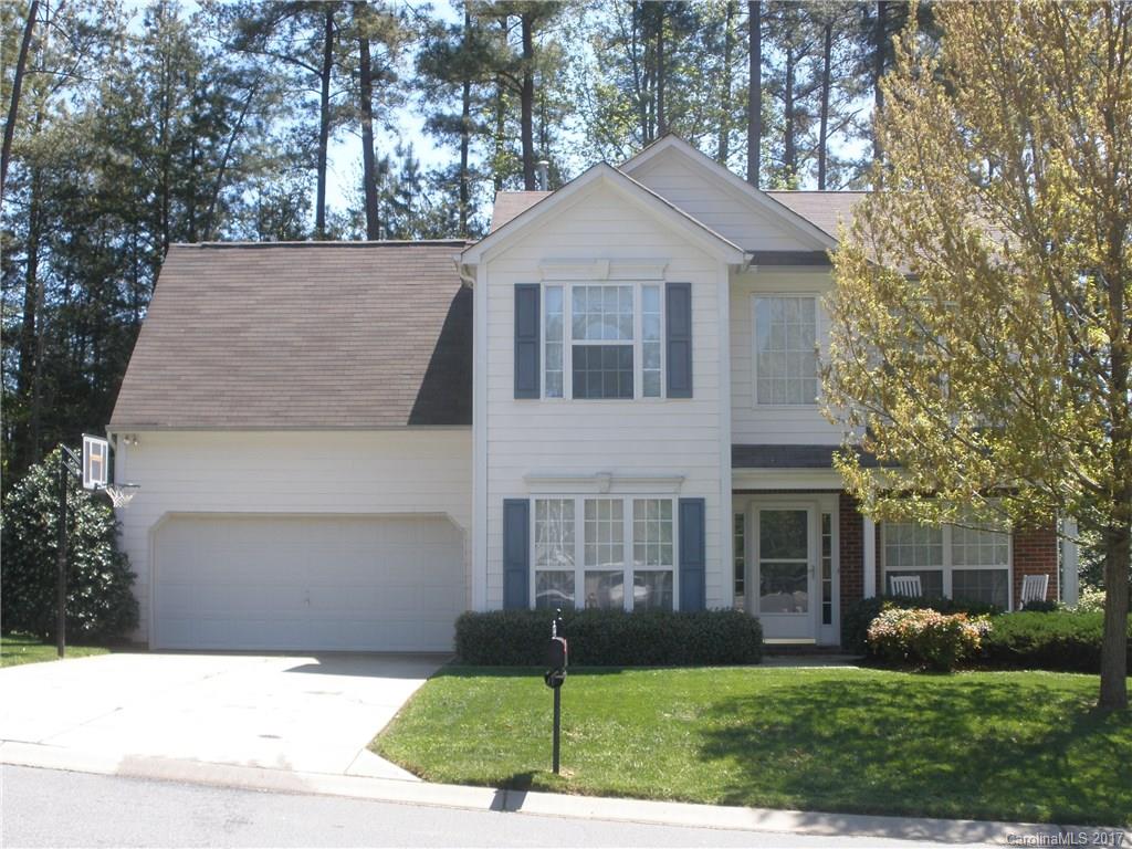 7311 Henderson Park Road Huntersville, NC 28078 - Photo 1 of 23 a front view of a house with a yard