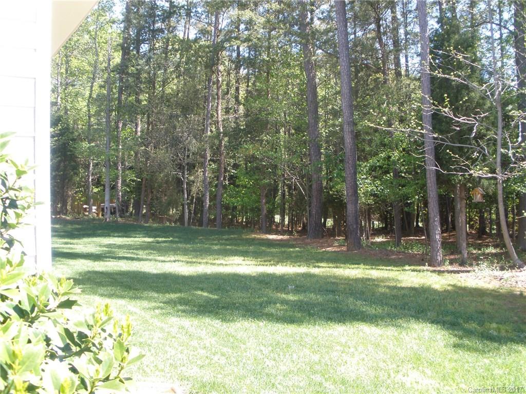 7311 Henderson Park Road Huntersville, NC 28078 - Photo 2 of 23 a view of a park with large trees