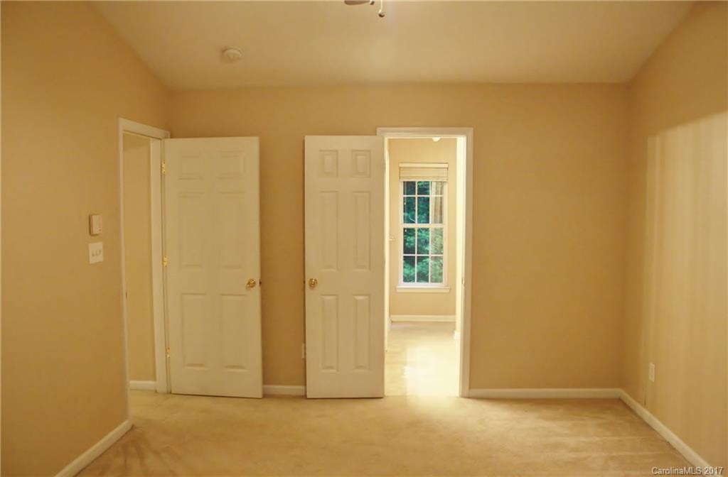 7311 Henderson Park Road Huntersville, NC 28078 - Photo 11 of 23 an empty room with windows