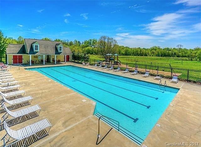 7311 Henderson Park Road Huntersville, NC 28078 - Photo 18 of 23 a view of a swimming pool with a patio