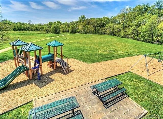 7311 Henderson Park Road Huntersville, NC 28078 - Photo 19 of 23 a view of a garden with sitting area