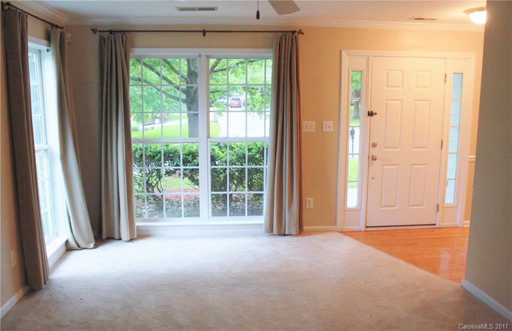 7311 Henderson Park Road Huntersville, NC 28078 - Photo 5 of 23 a view of empty room with floor to ceiling window