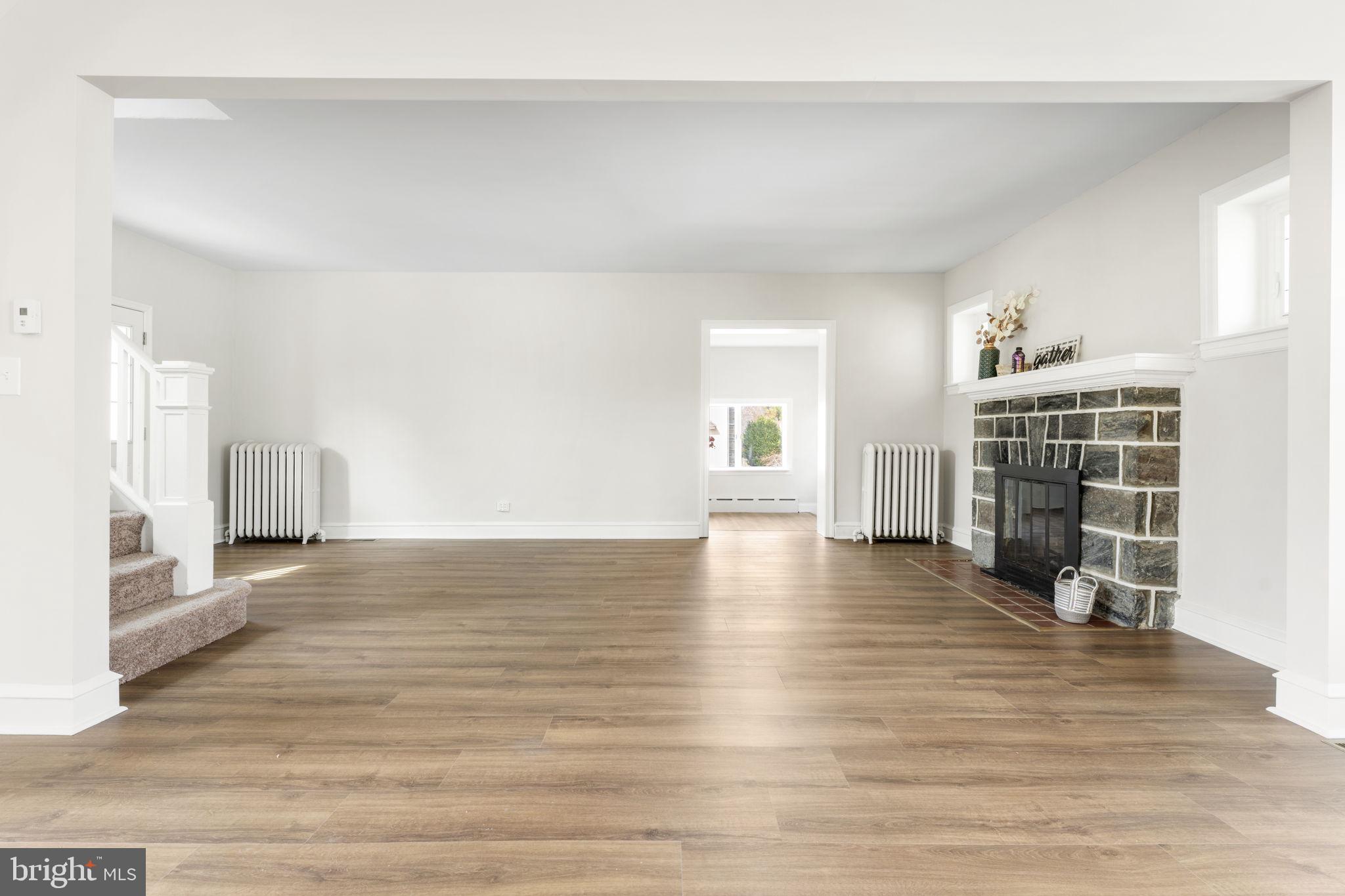 51 Harvard Road Havertown, PA 19083 - Photo 54 of 55 a view of empty room with wooden floor and window