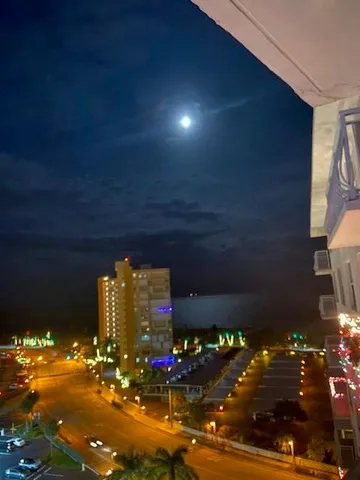 a view of a city with tall buildings