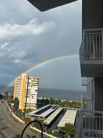a view of a city with tall buildings