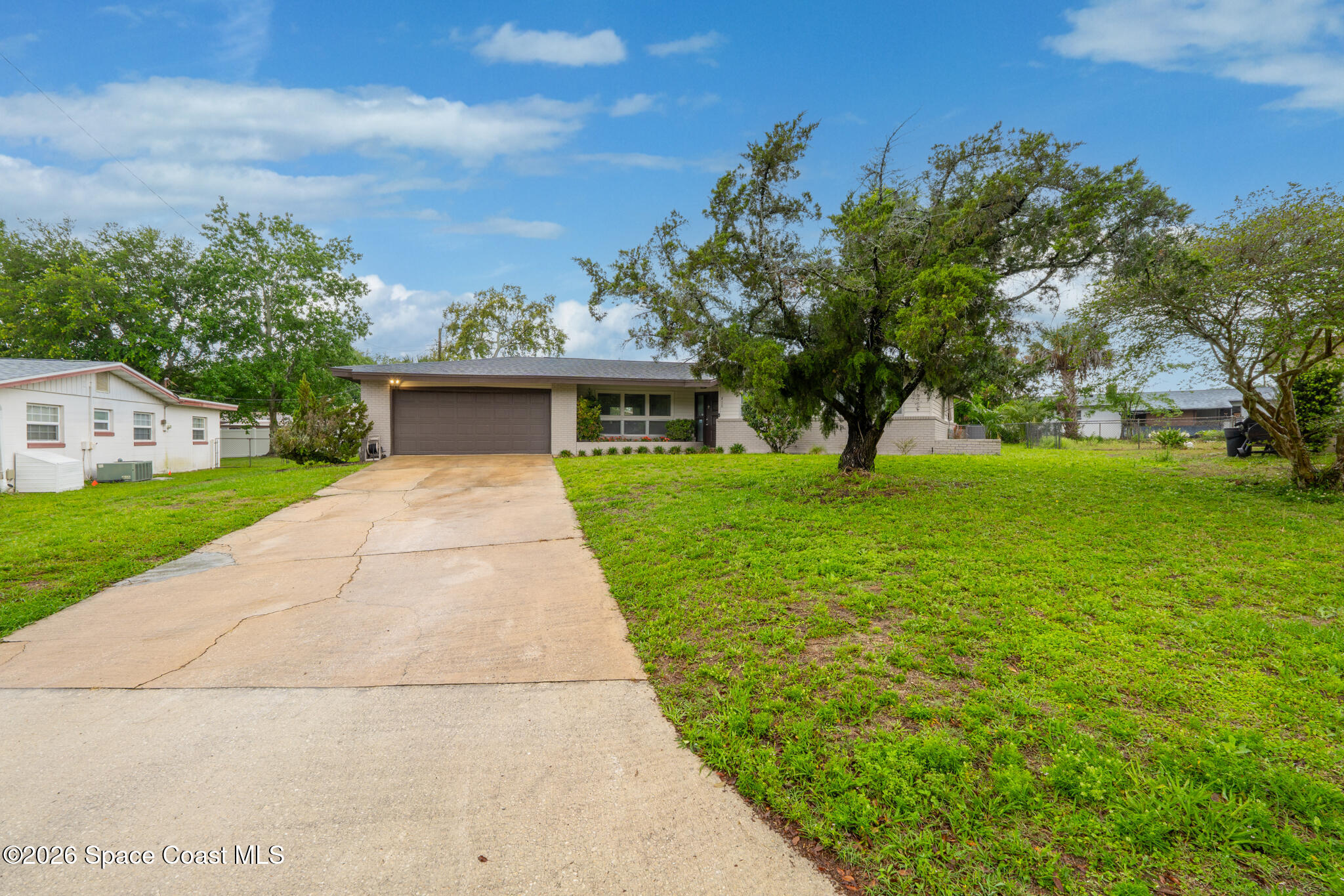 815 Glade Road Titusville, FL 32780 - Photo 1 of 30 a view of house with garden