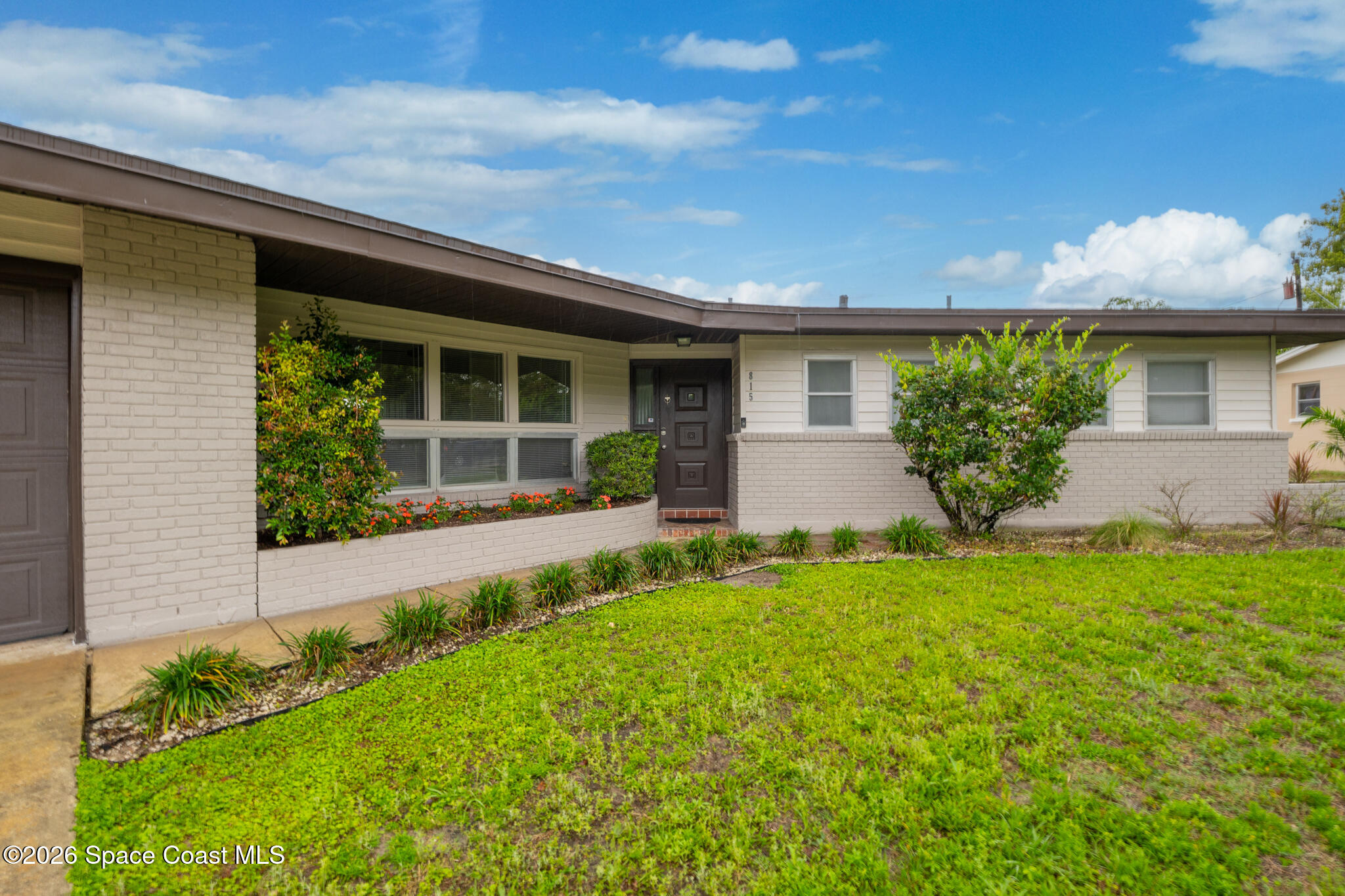 815 Glade Road Titusville, FL 32780 - Photo 2 of 30 a view of house with a yard
