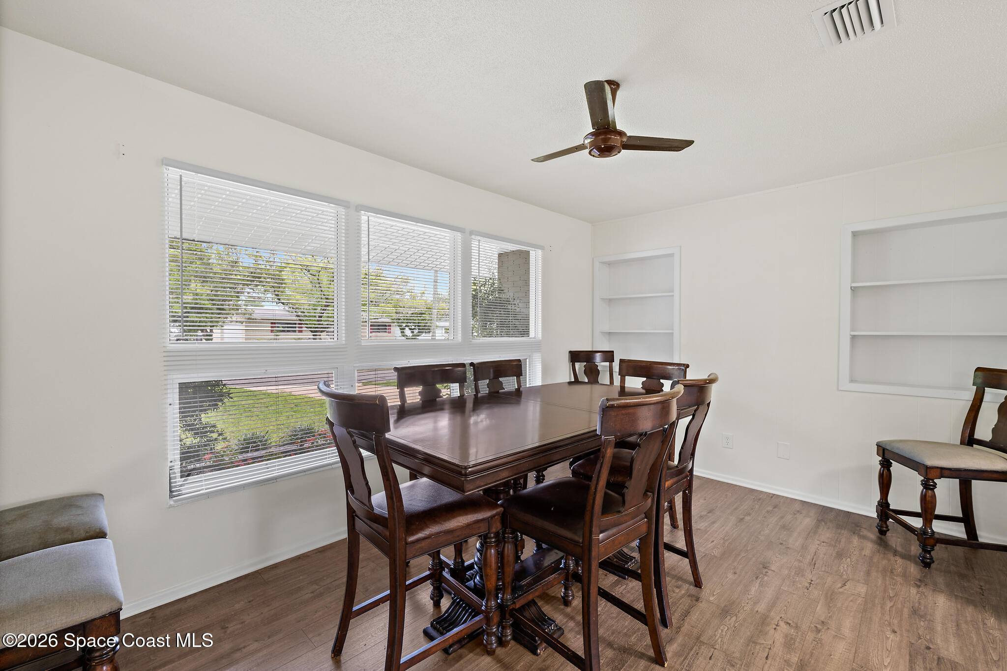 815 Glade Road Titusville, FL 32780 - Photo 7 of 30 a dining room with furniture and window