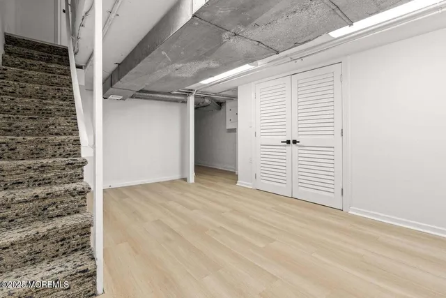 a bathroom with a sink and mirror