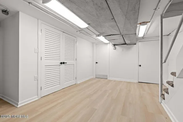 a bathroom with a sink a toilet and vanity