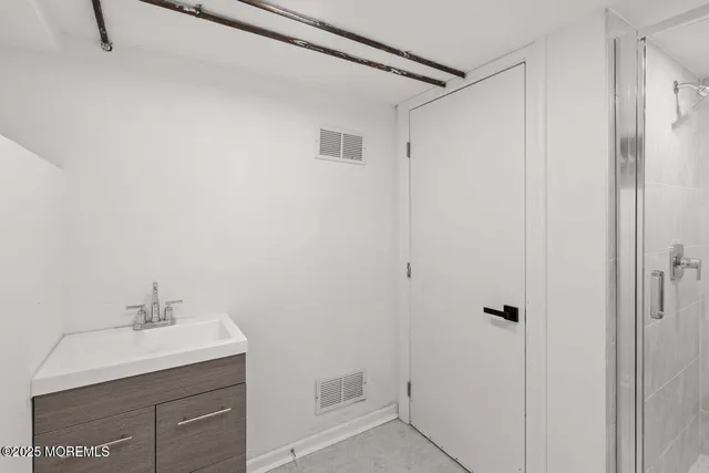 a view of building with parking area