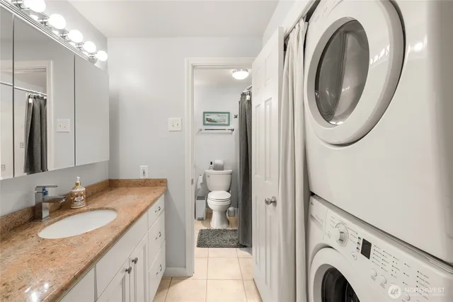 a view of a hallway with washer and dryer