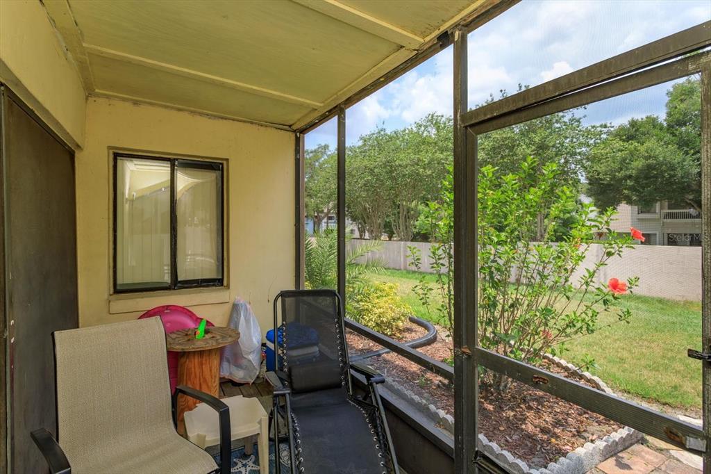 240 Orienta Point Street, Unit 240 Altamonte Springs, FL 32701 - Photo 11 of 20 a room with furniture and a window