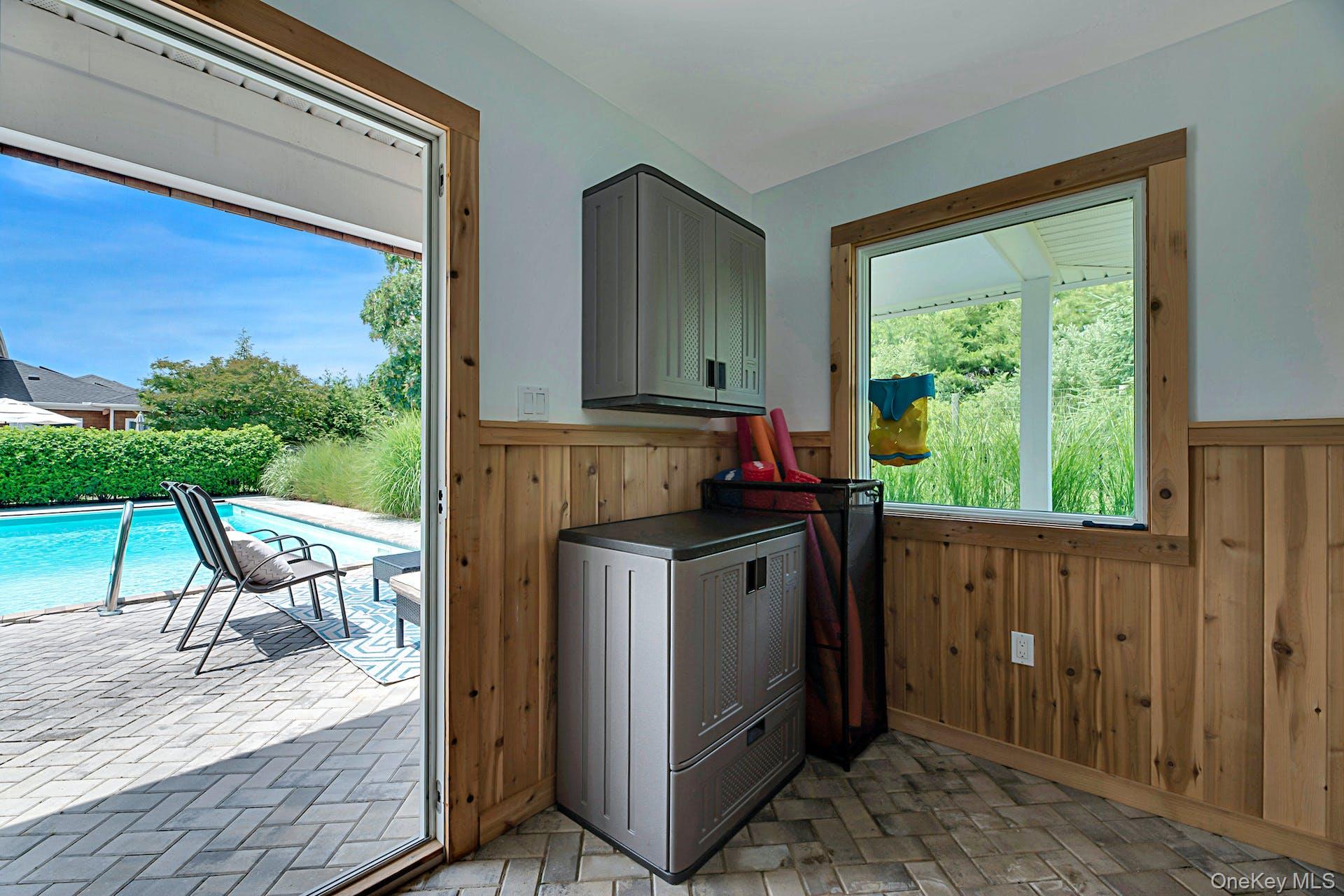 450 Sterling Woods Lane Southold, NY 11971 - Photo 31 of 41 a view of kitchen with furniture and a window
