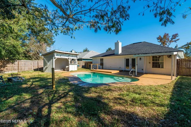 a garden view with a seating space