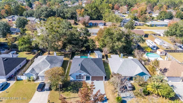 a picture of a room with a cabinet and a microwave