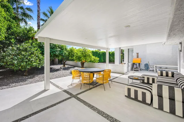 swimming pool view with seating space