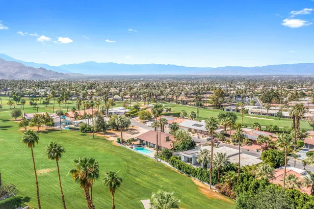 a view of a city with a lake