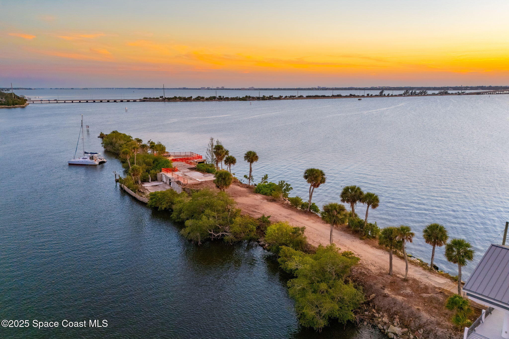 11680 Dragon Point Drive Merritt Island, FL 32952 - Photo 47 of 103 a view of a lake with a terrace