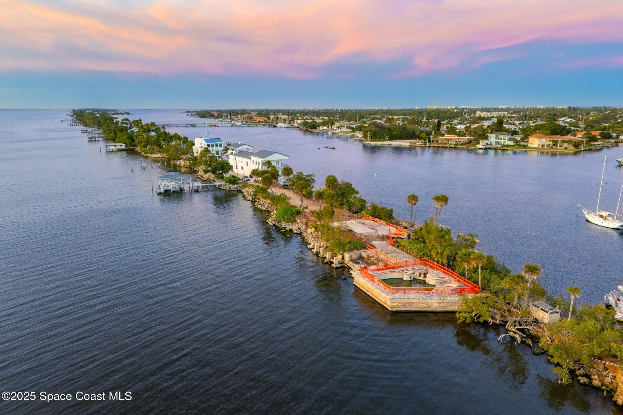 11680 Dragon Point Drive Merritt Island, FL 32952 - Photo 68 of 103 an aerial view of a houses with outdoor space