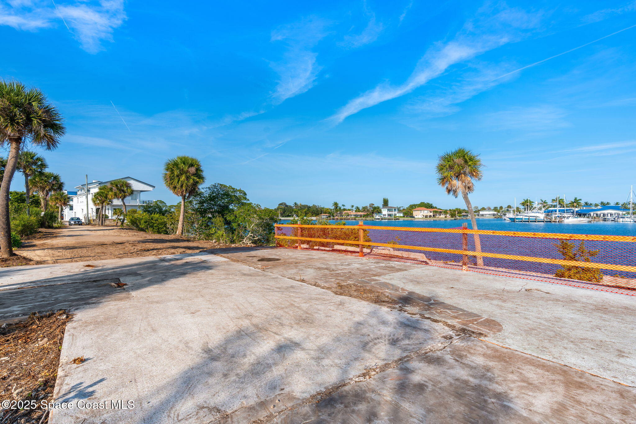 11680 Dragon Point Drive Merritt Island, FL 32952 - Photo 83 of 103 a view of a road with a yard