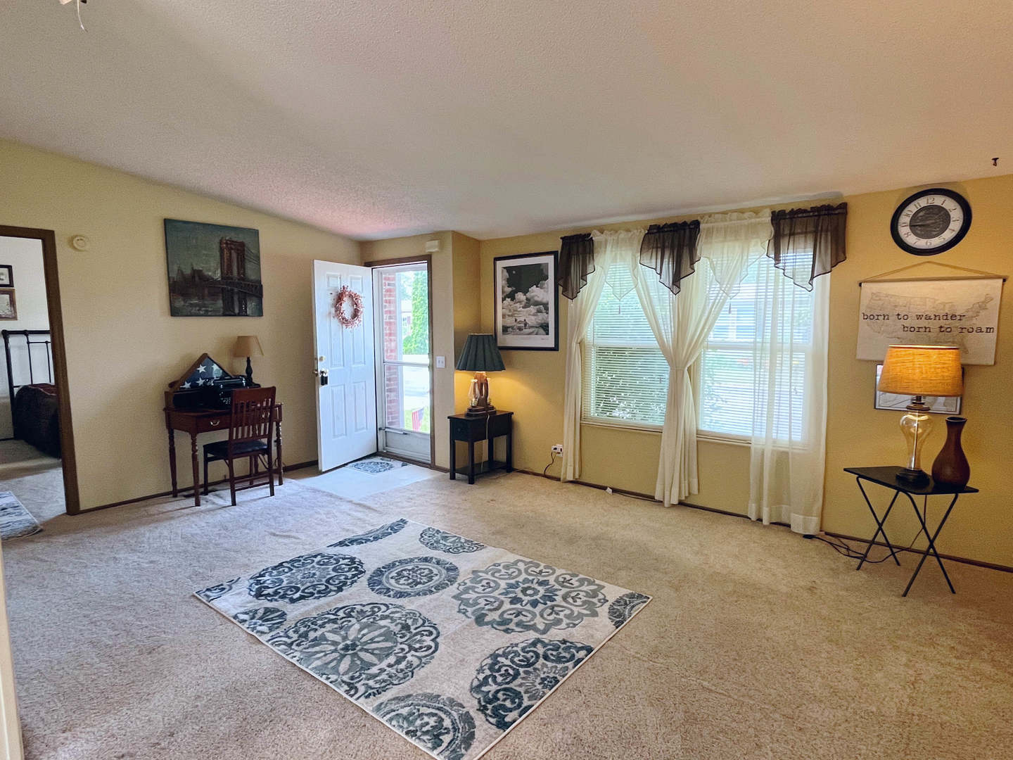 113 Cardinal Lane Sandwich, IL 60548 - Photo 3 of 14 a view of a livingroom with furniture and a window