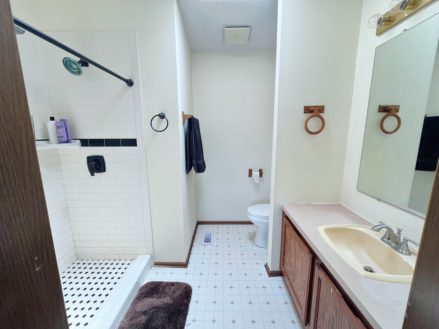 113 Cardinal Lane Sandwich, IL 60548 - Photo 9 of 14 a bathroom with a sink a toilet and shower