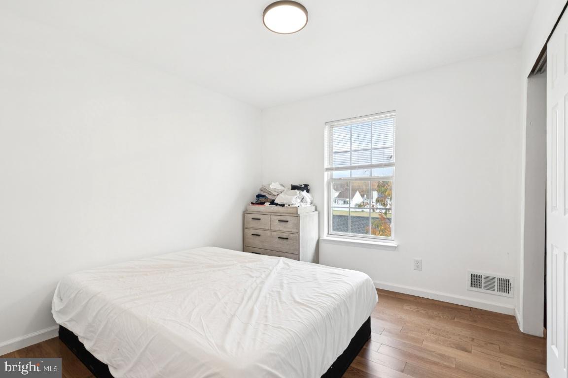 78 Kristopher Drive Hamilton, NJ 08620 - Photo 20 of 25 a bedroom with a bed and a window