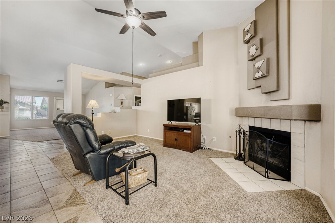 841 Rusty Anchor Way Henderson, NV 89002 - Photo 8 of 21 New carpet in family, ceiling light just replaced and wood burning fireplace