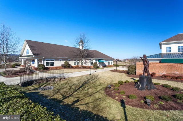 a view of a house with swimming pool