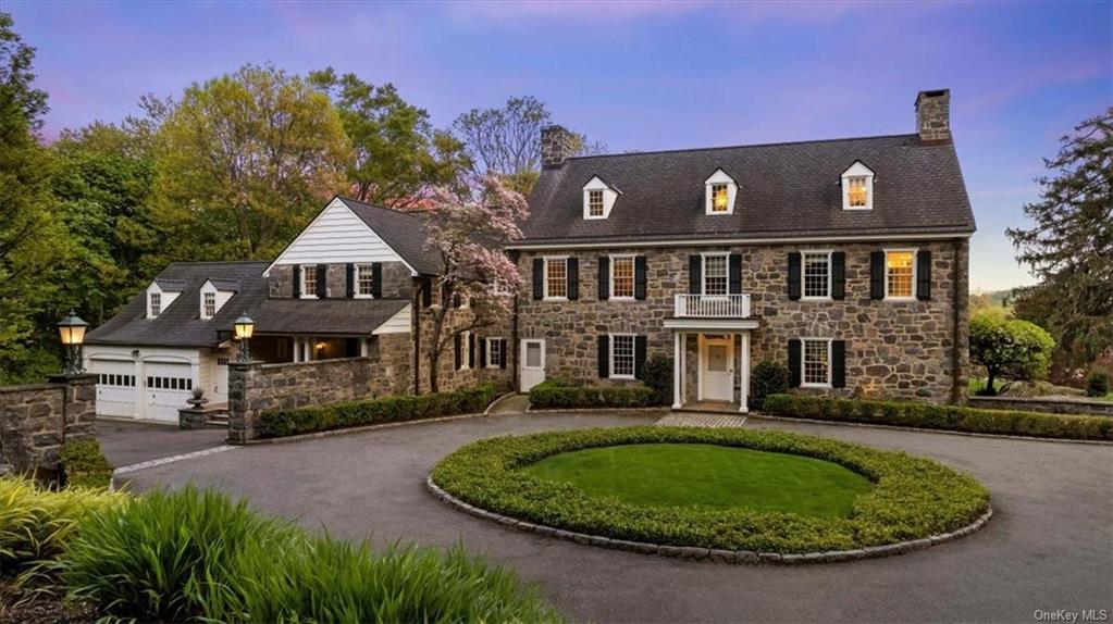 Elegant with a modern flair Stone Estate on sweeping 4 acres with lush gardens, in exclusive Irvington enclave.