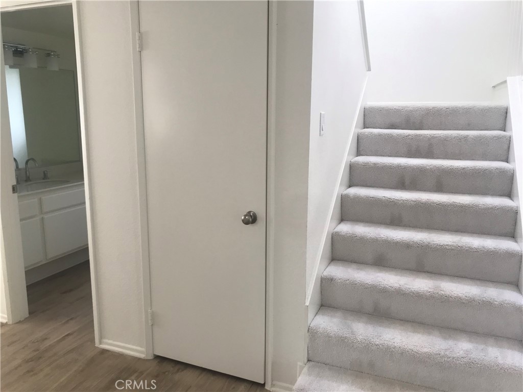 21 Silkberry Irvine, CA 92614 - Photo 10 of 18 a view of staircase with white walls