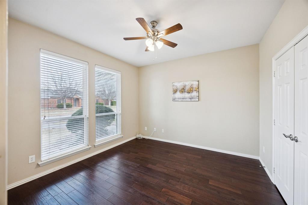 1516 High Country Lane Allen, TX 75002 - Photo 23 of 33 wooden floor in an empty room with a window