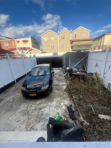 a car parked in front of a building