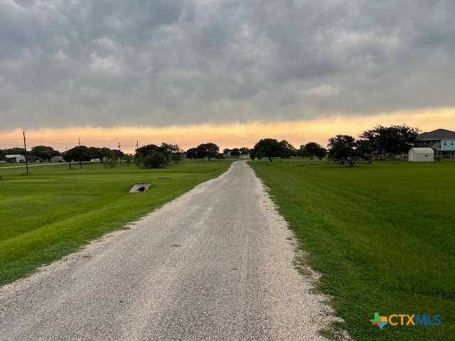 0 Calumet Drive Palacios, TX 77465 - Photo 3 of 3 a view of a golf course with a garden