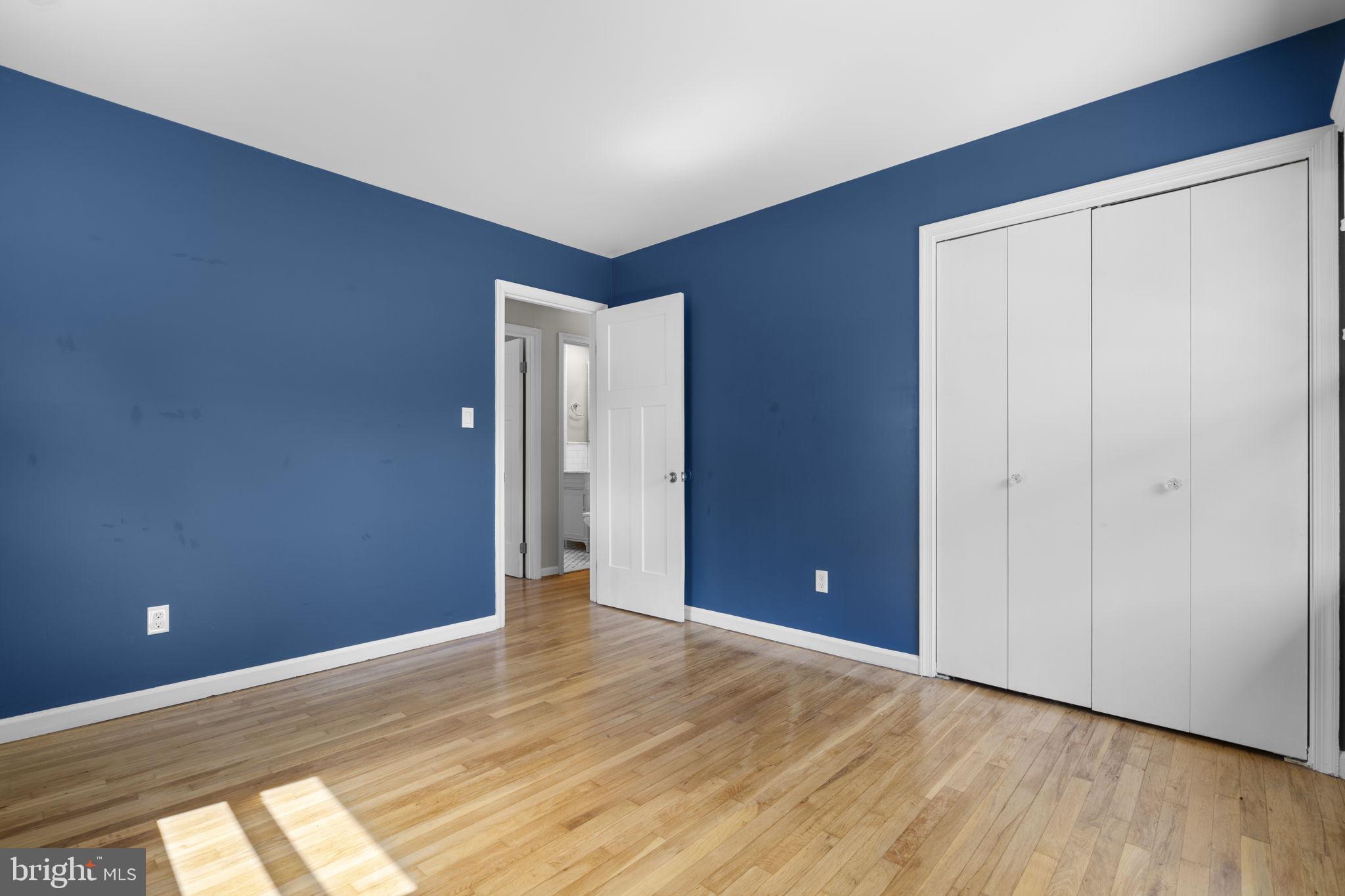 822 Loxford Terrace Silver Spring, MD 20901 - Photo 30 of 61 a view of an empty room and wooden floor